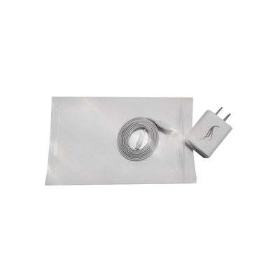 White charging cable and adapter on a white background